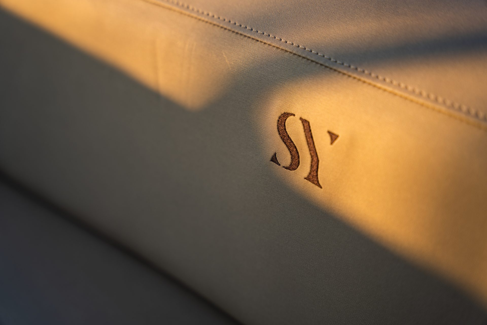 setag yacht logo on seat sunset